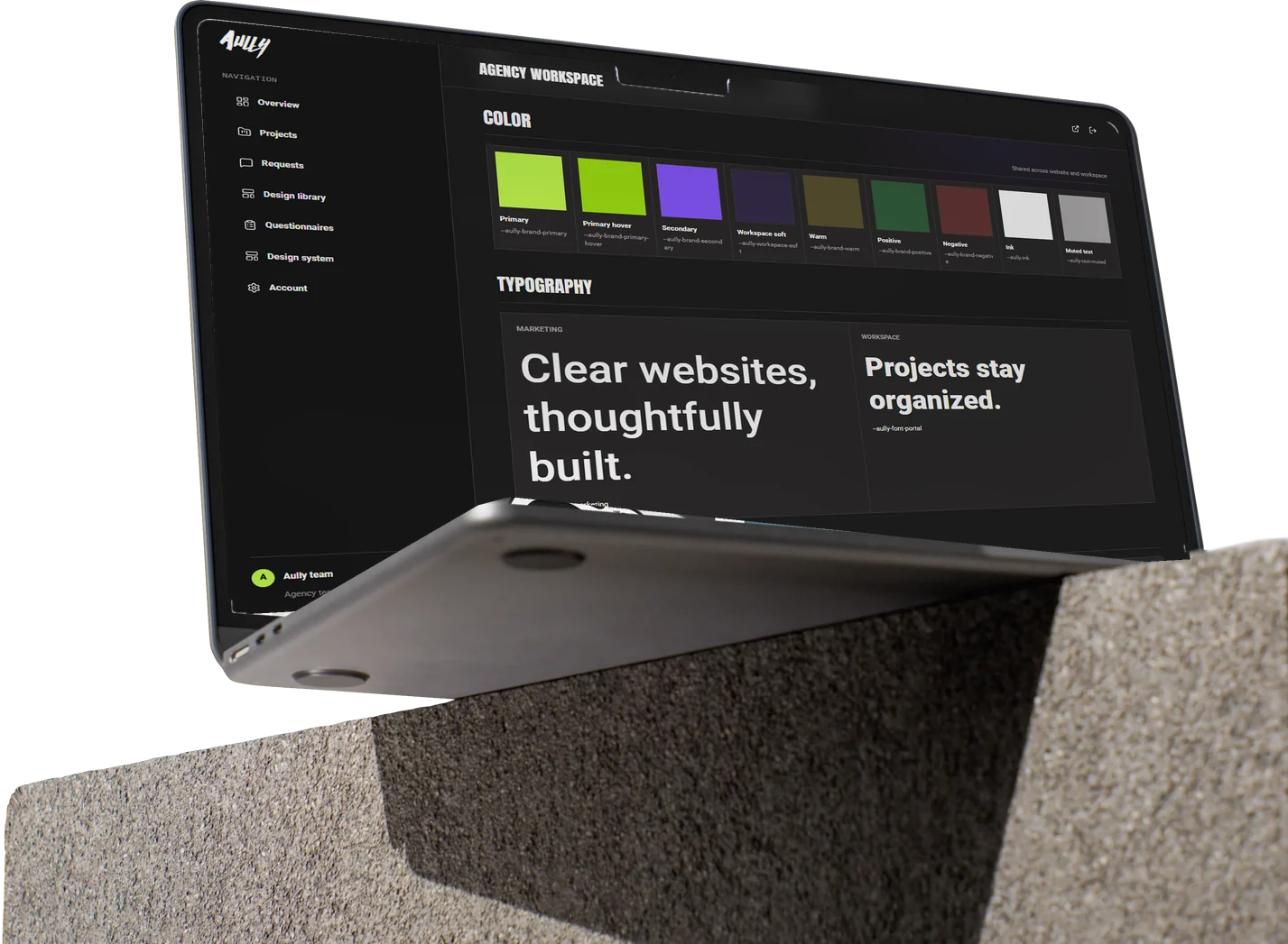 Aully design system with colour and typography, shown on a laptop