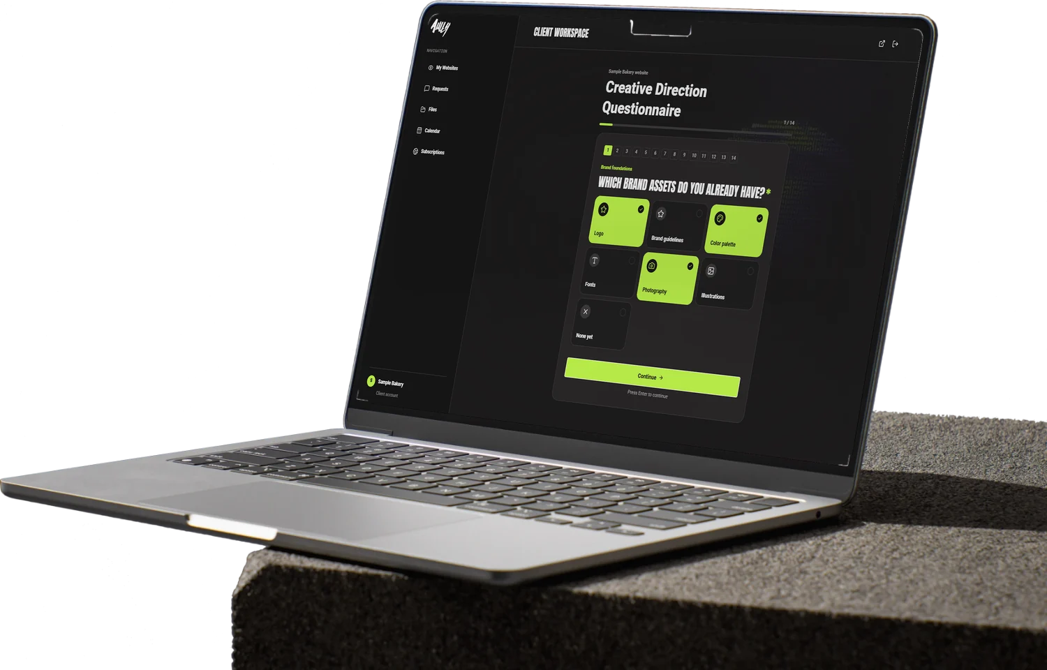 Aully creative direction questionnaire with icon choices, shown on a laptop